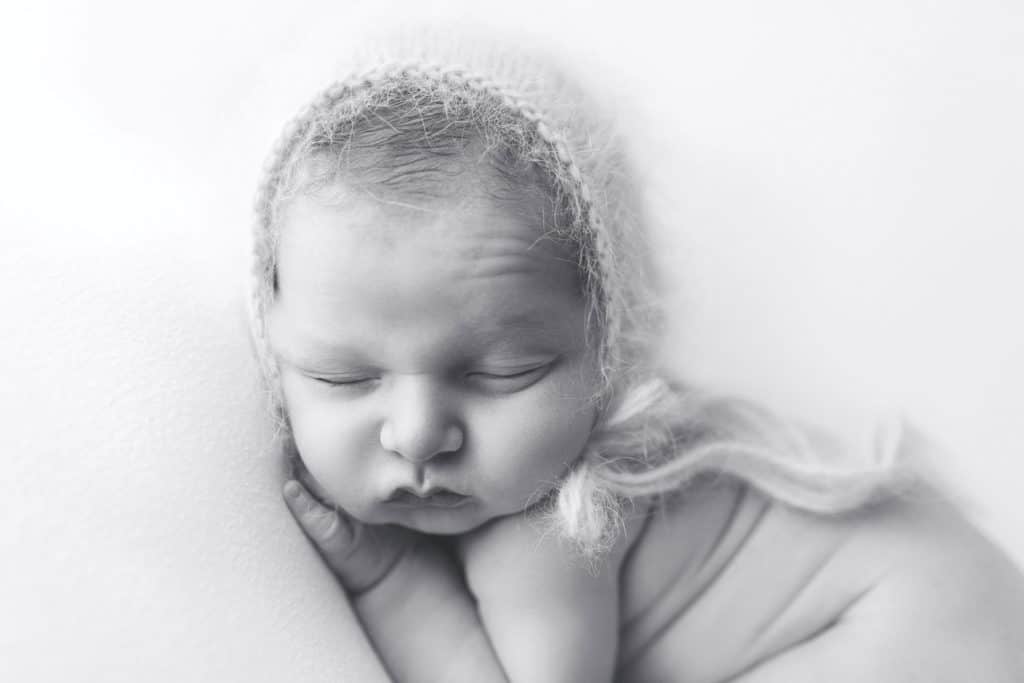 Newborn baby boy's first professional newborn photographers images in Jupiter Florida photography studio.