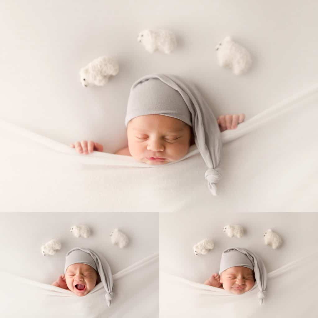 Boca Raton Photographer posing a newborn baby on his back with sheep k=jumping over his head.