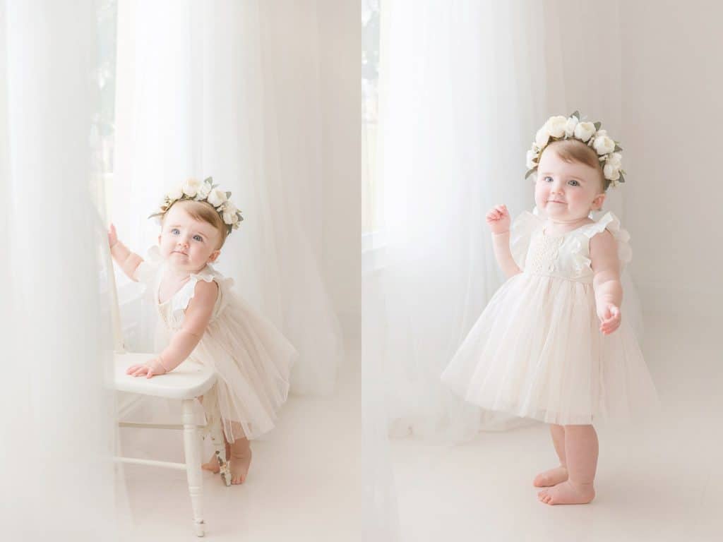 baby girl wearing a cream dress and flower crown during her First Birthday photoshoot