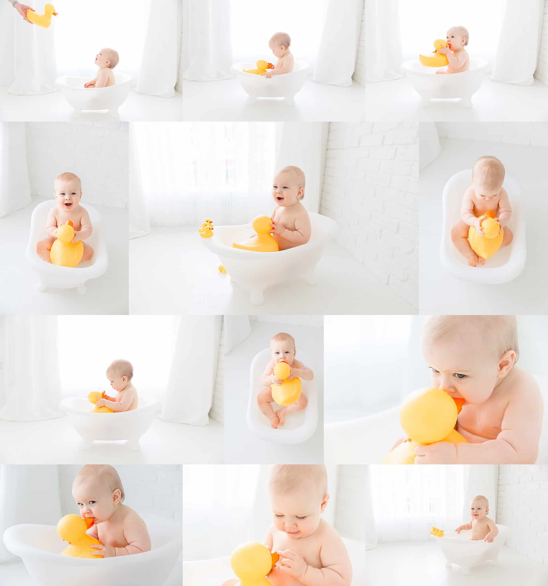 Baby being photographed in a bath tub with extra large rubber duck.