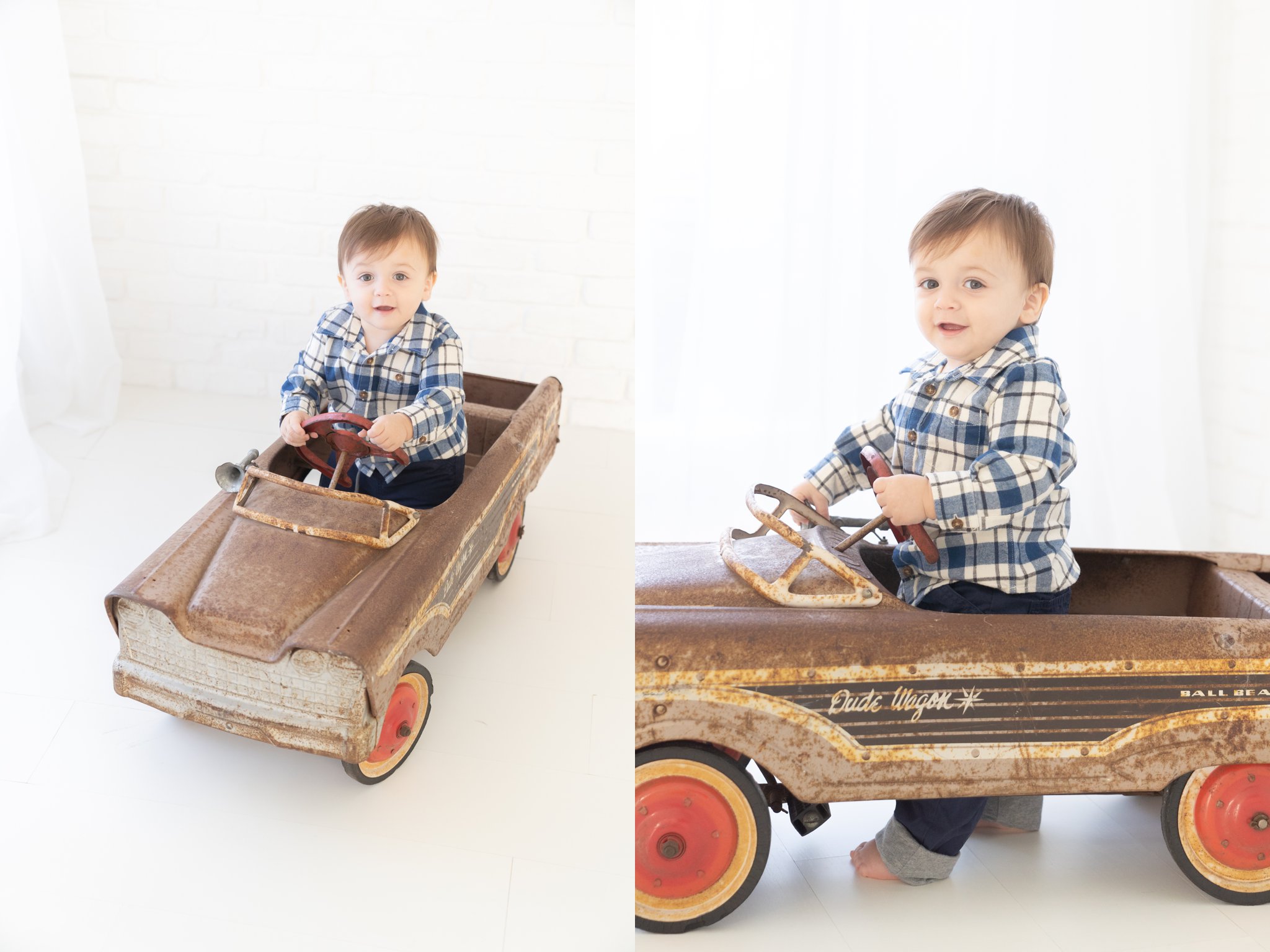 Baby boy being photographed in antique car.