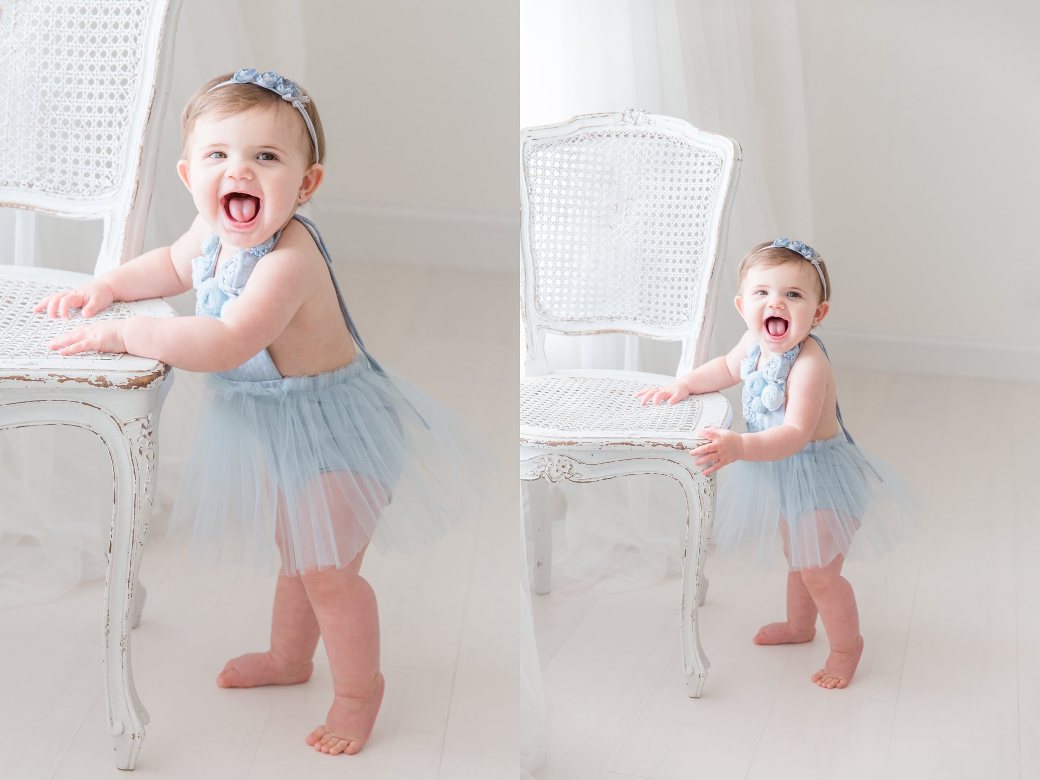 One year old baby having a portraits taken in handmade blue dress.