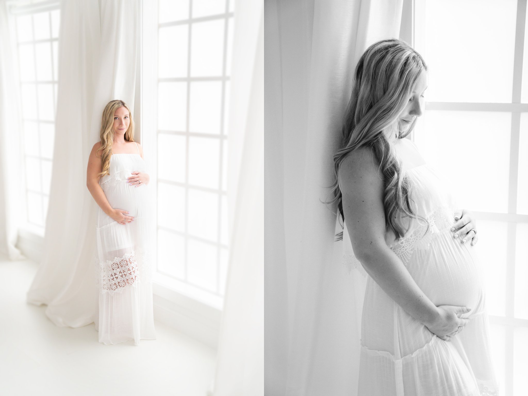 Pregnant woman standing by large window being photographed during maternity session