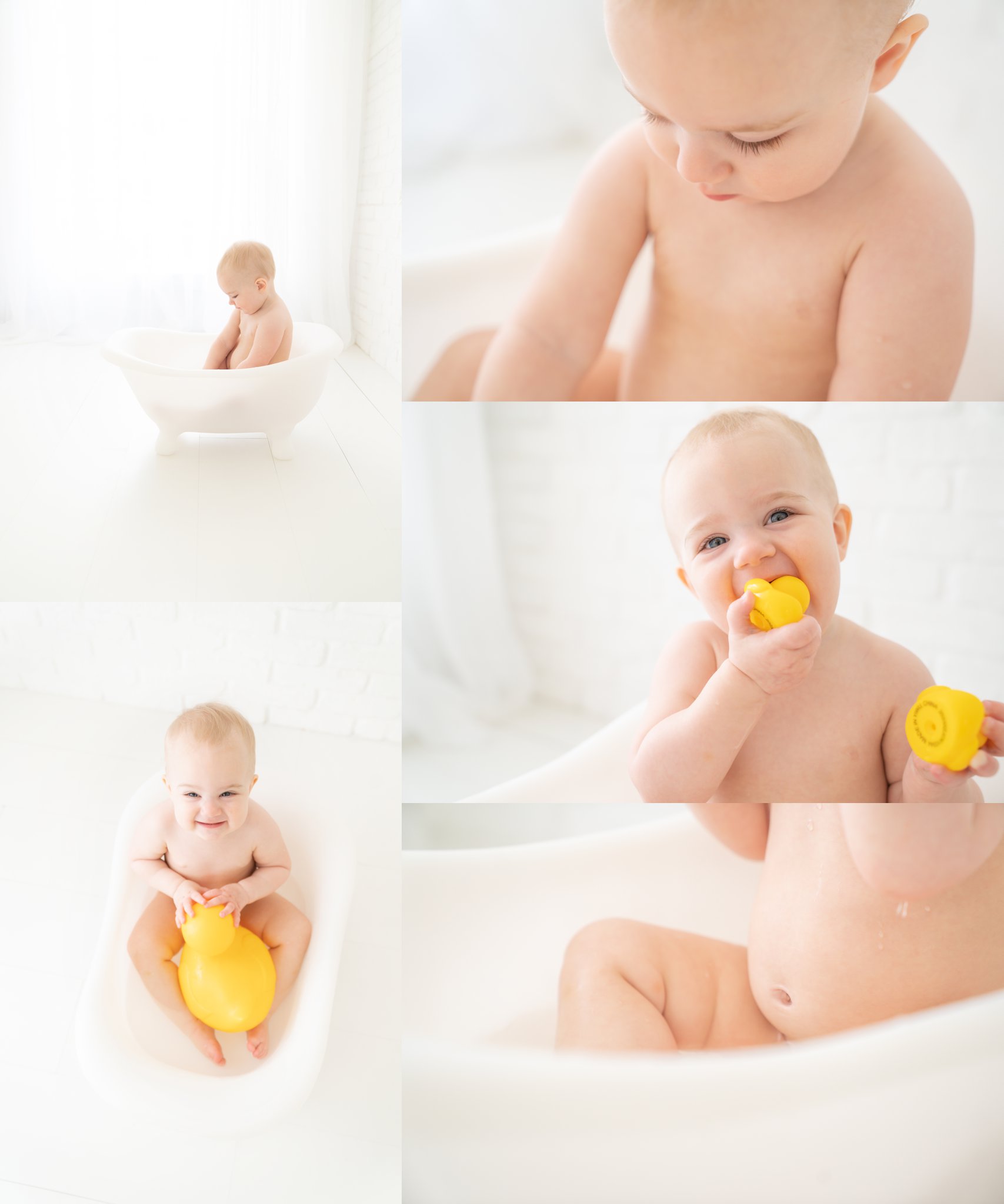 baby in a little bath tub playing with rubber ducks