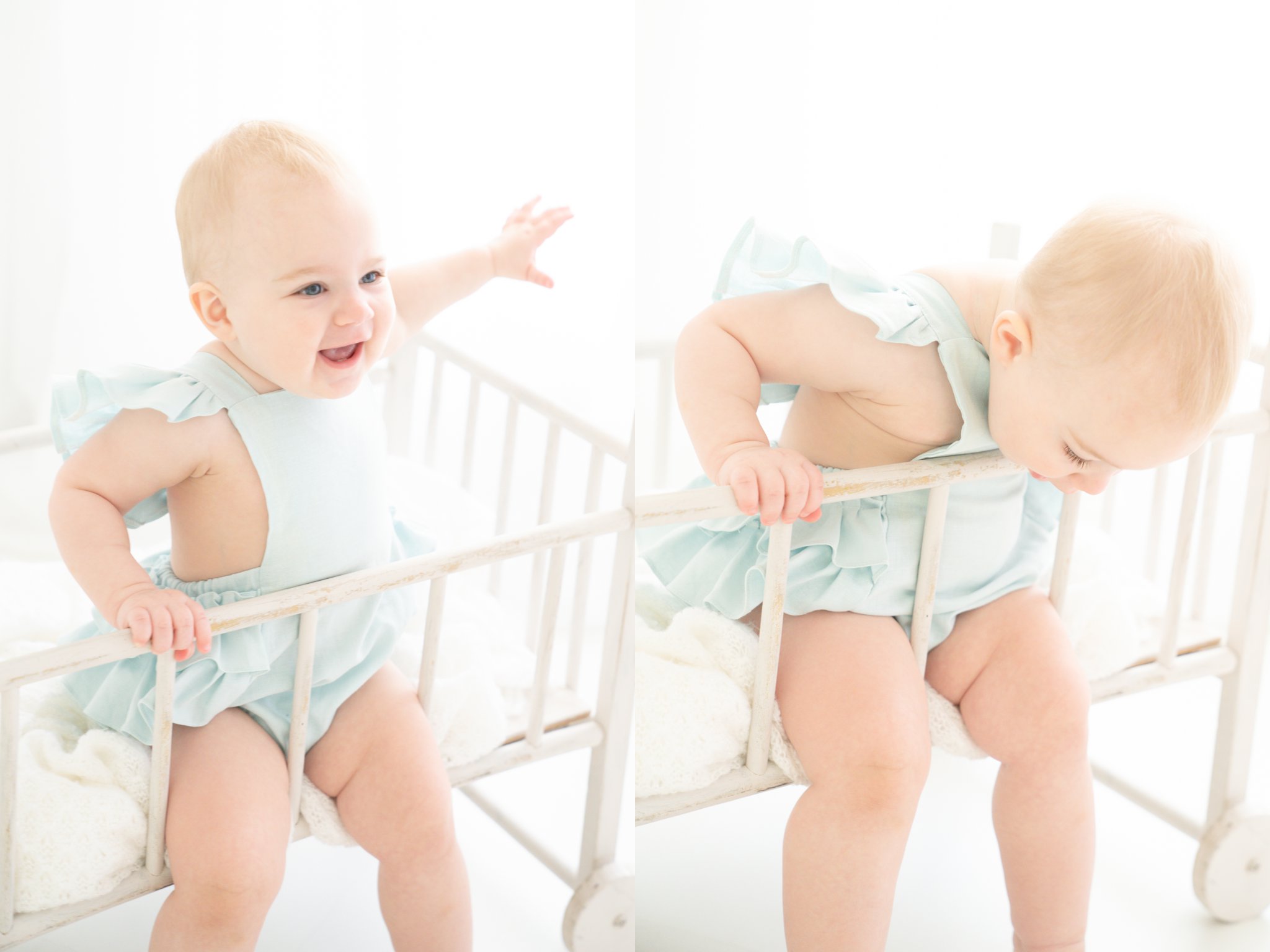 one year old baby in vintage crib with blue handmade romper